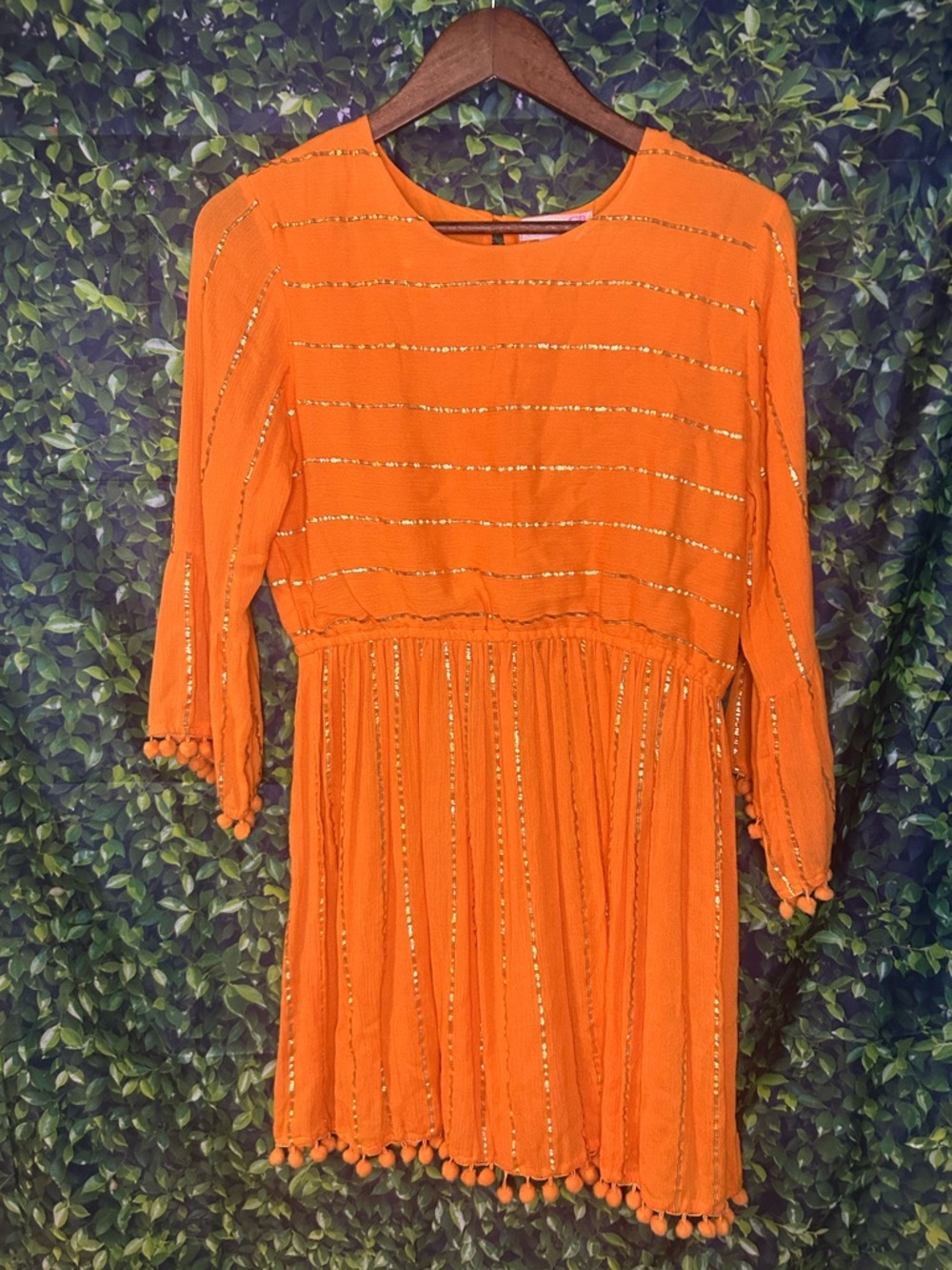 GB girls Orange Dress with Gold Stripe Accents and Pom-Pom Trim